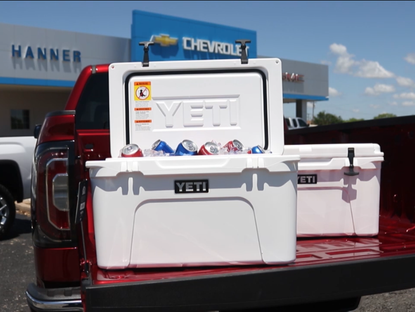 45 QT. YETI COOLER in a truck bed outside of Hanner Chevrolet Trucks