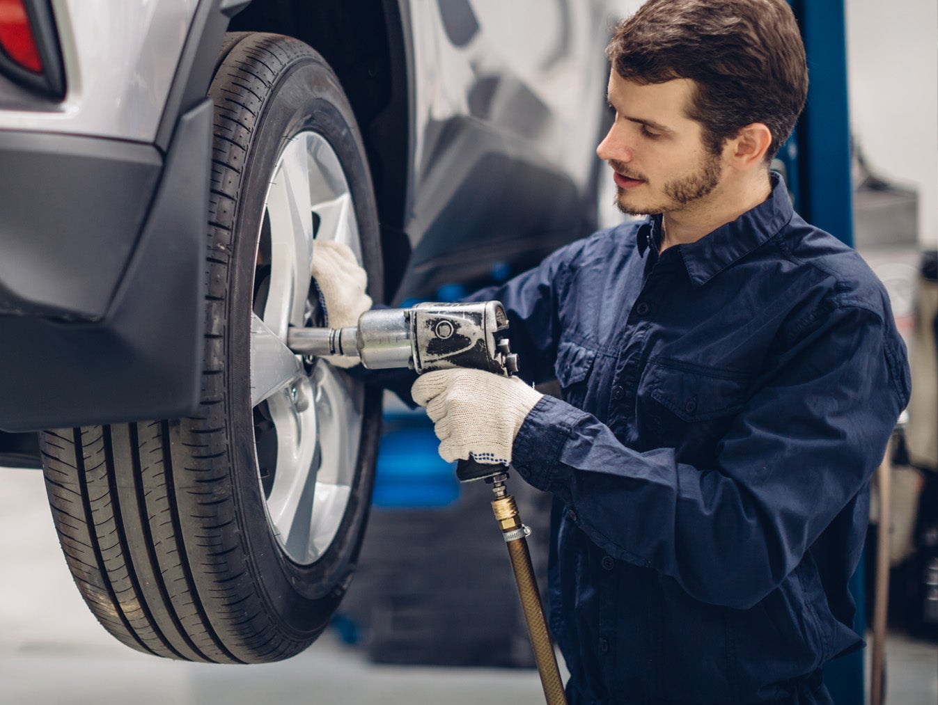 Man inspecting tires